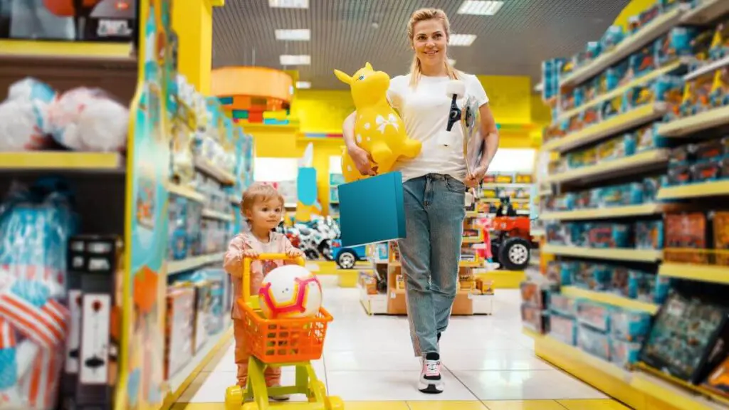 Playmobil Caballos madre e hijo comprando juguetes dentro de una juguetería 